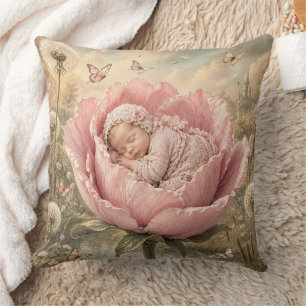 Sleeping baby in pink flower throw pillow
