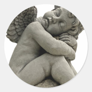 Sleeping Cherub Angel Sculpture Round Sticker. Classic Round Sticker