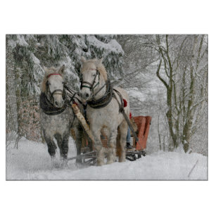 Sleigh Ride in the Snowy Forest Cutting Board