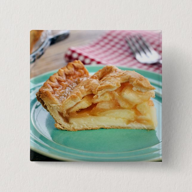 Slice of fresh baked apple pie on plate 2 inch square button (Front)