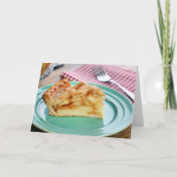 Slice of fresh baked apple pie on plate