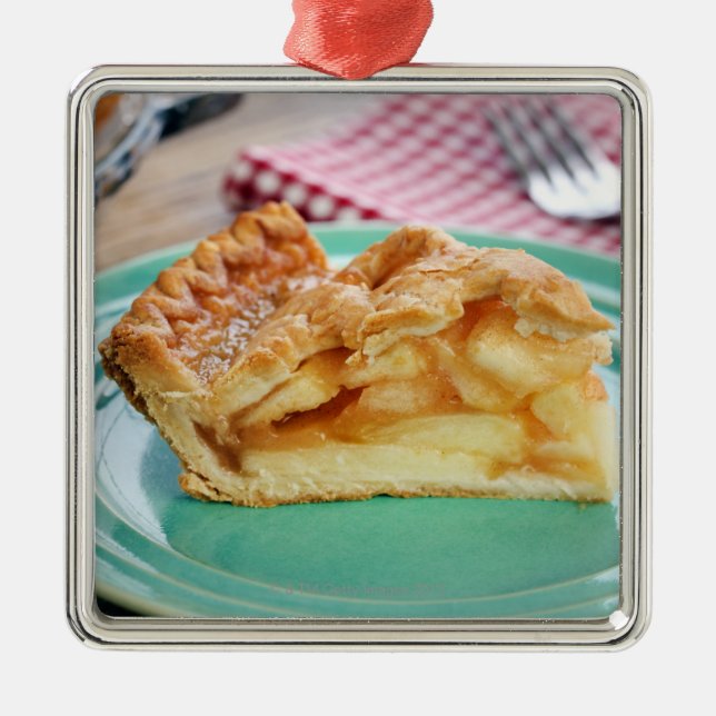 Slice of fresh baked apple pie on plate metal ornament (Front)