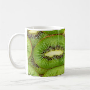 Slices of fresh and ripe kiwi fruit in rowsbrown,c coffee mug