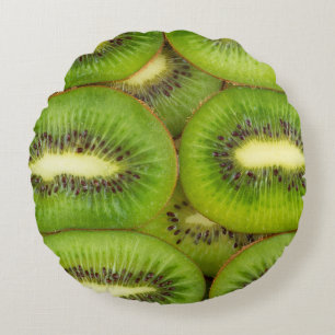 Slices of fresh and ripe kiwi fruit in rowsbrown,c round pillow
