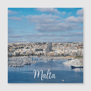 Sliema harbor with modern buildings and boats mag