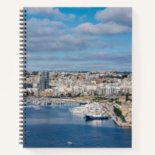 Sliema harbour with modern buildings and boats notebook