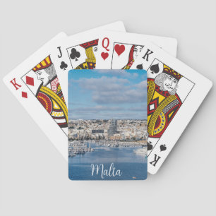 Sliema harbour with modern buildings and boats playing cards