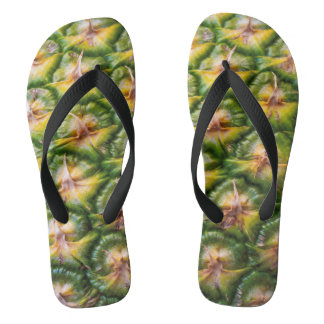 Slippers with pineapple print close up flip flops