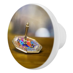 SlipperyJoe Hanukkah dreidel gift octagonal base b Ceramic Knob