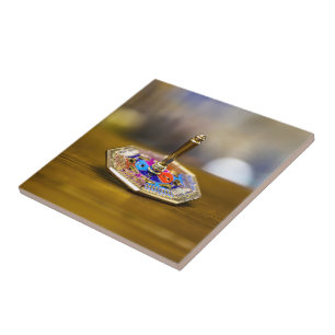SlipperyJoe Hanukkah dreidel gift octagonal base b Tile