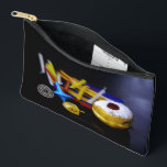 SlipperyJoe Hanukkah symbolic still life holiday e Accessory Pouch<br><div class="desc">SlipperyJoe Hanukkah symbolic still life holiday essence vibrant meaningful objects colorful slender pile menorah candles artistic red blue yellow and white sufganiyah doughnut classic jelly-filled commemorate miracle of the oil dreidels metallic gold glossy blue Hebrew great miracle happened there metallic pewter star of David medallion light resilience community themes spiritual...</div>