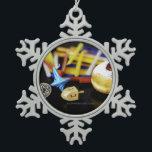 SlipperyJoe Hanukkah symbolic still life holiday e Snowflake Pewter Christmas Ornament<br><div class="desc">SlipperyJoe Hanukkah symbolic still life holiday essence vibrant meaningful objects colourful slender pile menorah candles artistic red blue yellow and white sufganiyah doughnut classic jelly-filled commemorate miracle of the oil dreidels metallic gold glossy blue Hebrew great miracle happened there metallic pewter star of David medallion light resilience community themes spiritual...</div>