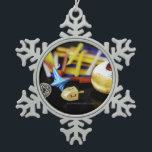 SlipperyJoe Hanukkah symbolic still life holiday e Snowflake Pewter Christmas Ornament<br><div class="desc">SlipperyJoe Hanukkah symbolic still life holiday essence vibrant meaningful objects colourful slender pile menorah candles artistic red blue yellow and white sufganiyah doughnut classic jelly-filled commemorate miracle of the oil dreidels metallic gold glossy blue Hebrew great miracle happened there metallic pewter star of David medallion light resilience community themes spiritual...</div>