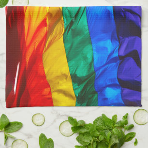 SlipperyJoe's artistic Wave Gay Pride Flag gifts L Kitchen Towel
