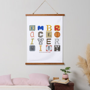 SlipperyJoe's embraces diversity cut-out letters c Hanging Tapestry