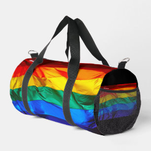 SlipperyJoe's gay pride flag waving red orange yel Duffle Bag