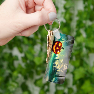SlipperyJoe's glowing jack‑o’-lantern Halloween wa Keychain