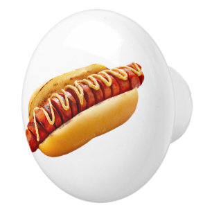 SlipperyJoe's hot dog nestled soft bun vibrant yel Ceramic Knob