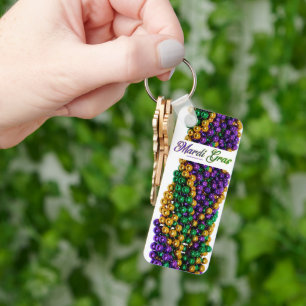 SlipperyJoe's iconic Mardi Gras–themed image elega Keychain