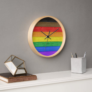 SlipperyJoe's Inclusive gay pride flag textured ru Clock