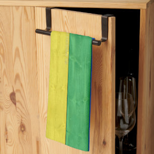 SlipperyJoe's pride wooden flag horizontal rainbow Kitchen Towel