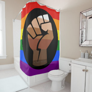 SlipperyJoe's queer people colour flag raised fist