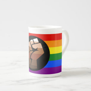 SlipperyJoe's queer people colour flag raised fist Bone China Mug