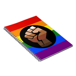 SlipperyJoe's queer people colour flag raised fist Notebook