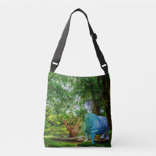SlipperyJoe's rhinoceros lush tropical setting pri Crossbody Bag