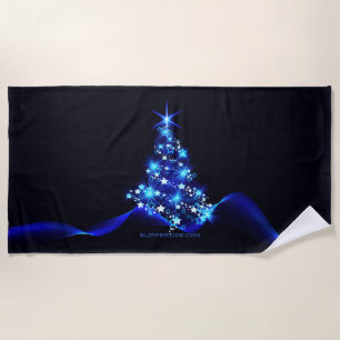 SlipperyJoe's stylized glowing Christmas tree brig Beach Towel