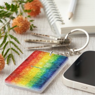 SlipperyJoe's tie-dyed flag rainbow pressed into s Keychain