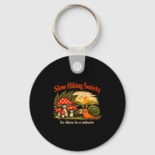 Slow hikers society be there in a minute snail keychain