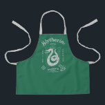 SLYTHERIN™ Pride Ambition Cunning Crest Apron<br><div class="desc">Show your house pride with this bold Slytherin™ crest design, honoring the ambition and cunning that define this iconic Hogwarts™ house. Featuring the striking serpent coiled within a classic shield, the artwork highlights Slytherin’s core traits — Ambition, Pride, and Cunning — in a clean, vintage-inspired layout. Rendered in signature house...</div>