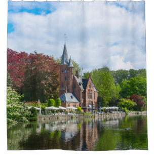 Small castle near lake in Bruges, Belgium