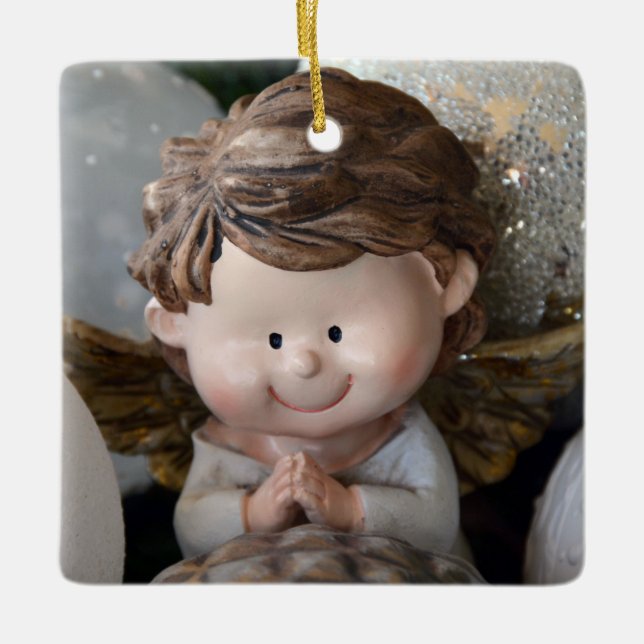 Small Christmas gifts Ceramic Ornament (Front)