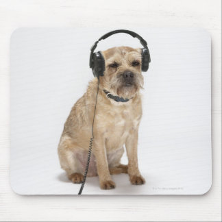 Small dog wearing headphones mouse pad