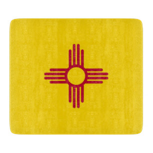 Small glass cutting board with New Mexico flag