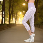 Small Linked  Purple Hearts Pattern Over White Capri Leggings<br><div class="desc">This fun design features a pattern of small linked purple hearts over a white background and pastel purple waistband.</div>