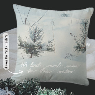 Small spruces covered with fresh snow. throw pillow