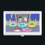 Small Town Drive-In Movie Business Card Holder<br><div class="desc">Pass the popcorn! This Small Town Drive-In Movie Business Card Holder will transport you to a simpler time, when gas was cheap, rock and roll was young, and the movie stars of Hollywood's Golden Age shined brighter than the night sky. The design features the rear view of five, virtually indestructible,...</div>