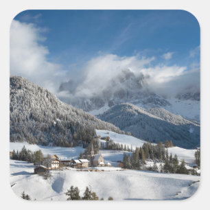 Small village with Dolomites mountains in the snow Square Sticker