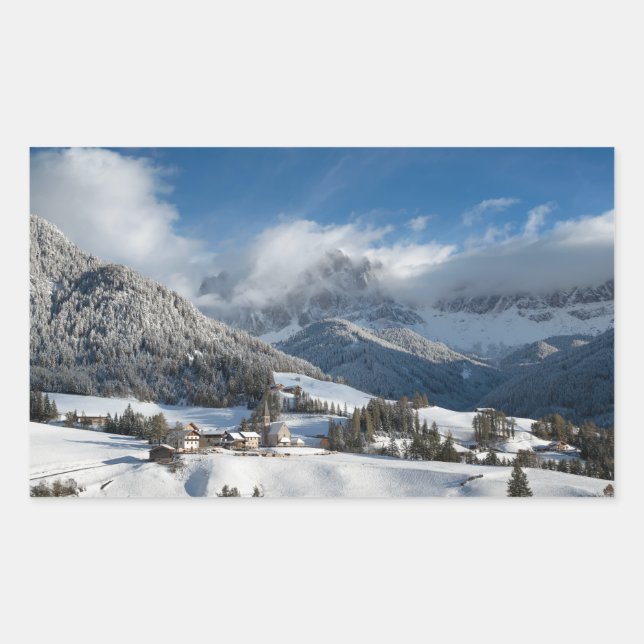 Small village with Dolomites mountains in the snow Sticker (Front)