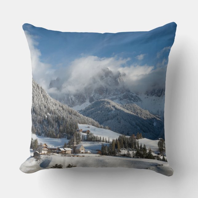 Small village with Dolomites mountains in the snow Throw Pillow (Front)
