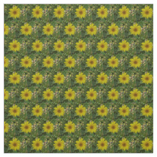 small yellow sunflowers in garden fabric
