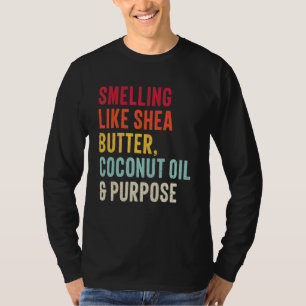 smelling like shea butter coconut oil and purpose  T-Shirt