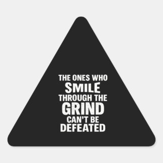 Smile grind gym motivation quote with white text triangle sticker