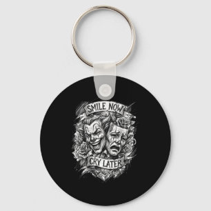 Smile now cry later theatre masks keychain