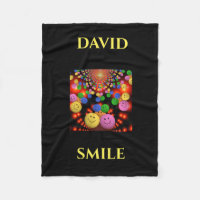Smiley face personalized name fleece blanket.