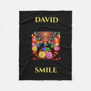 Smiley face personalized name fleece blanket. blanket