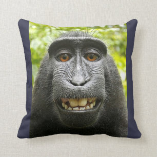 Smiling Crested Macaque Throw Pillow